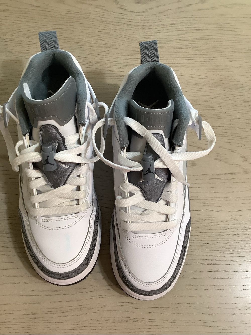 Jordan Kids White and Gray High-Top Sneakers with Silver Accents
